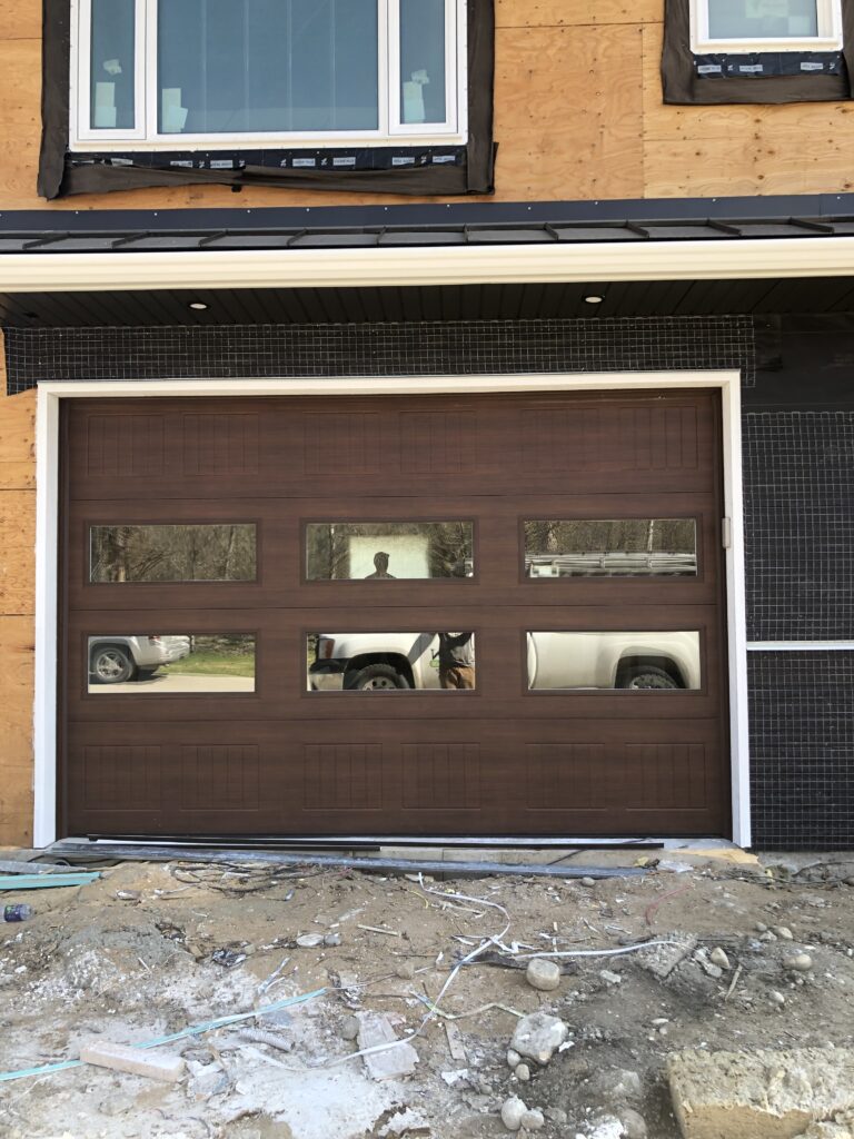 Modern faux wood garage door with windows 