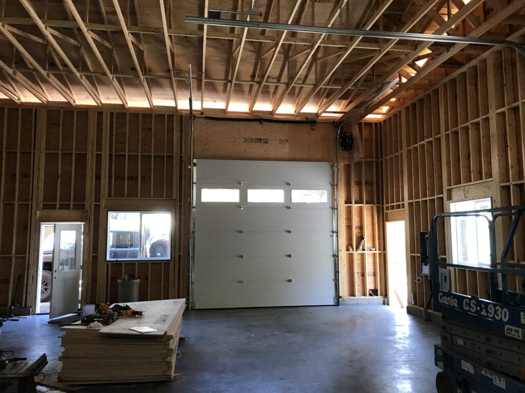 Inside of a commercial door after a new garage door opener installation