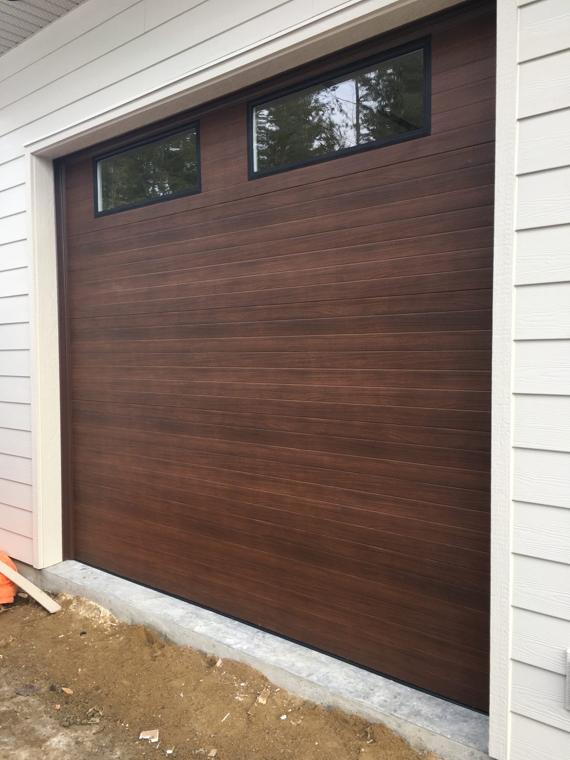 Faux wood plank style garage door
