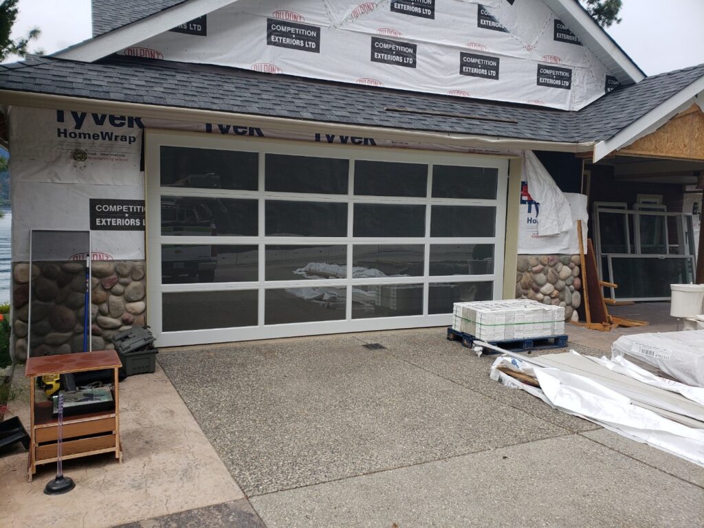 Modern full view garage door with white frames