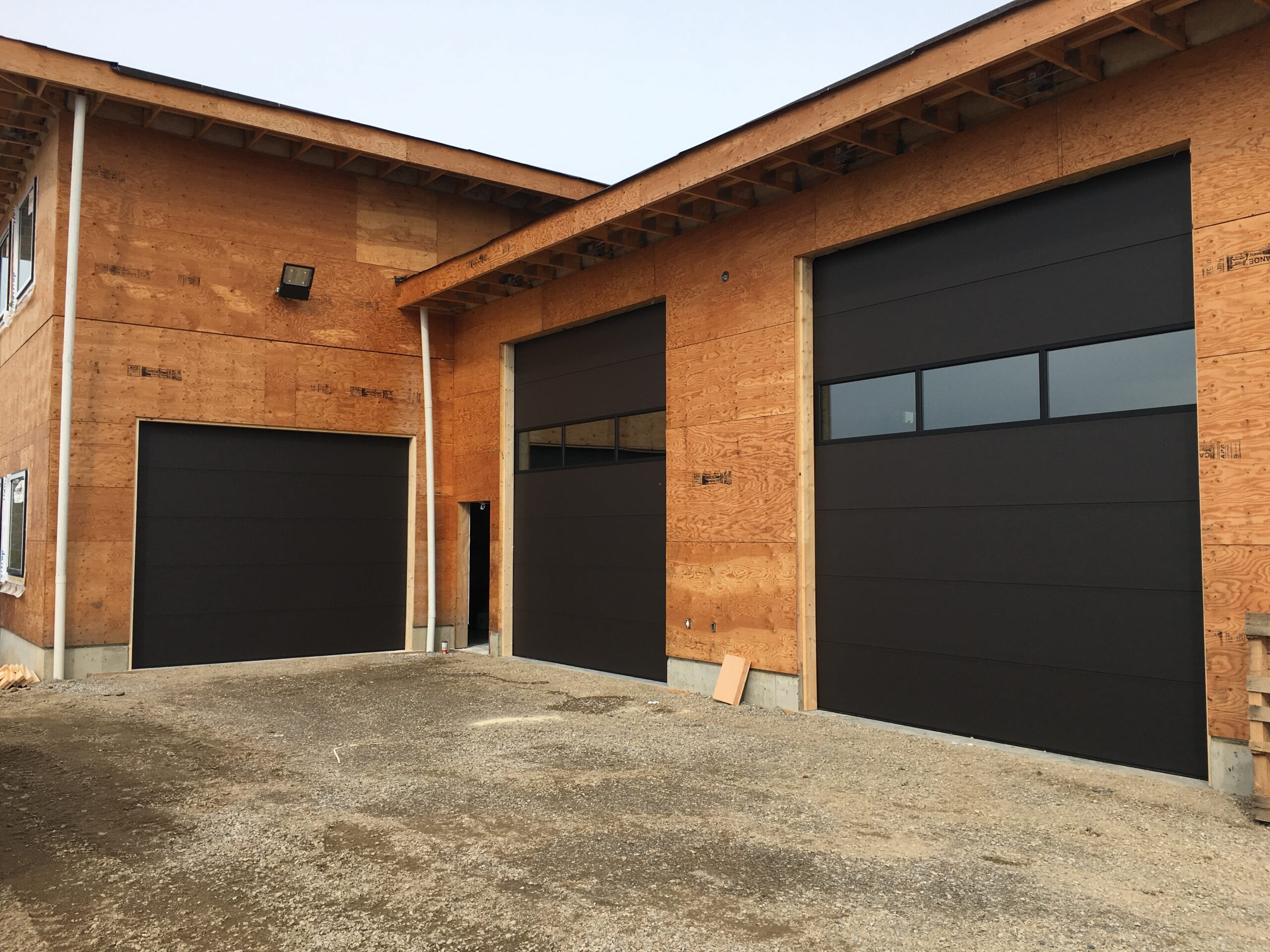 Modern flush panel garage doors
