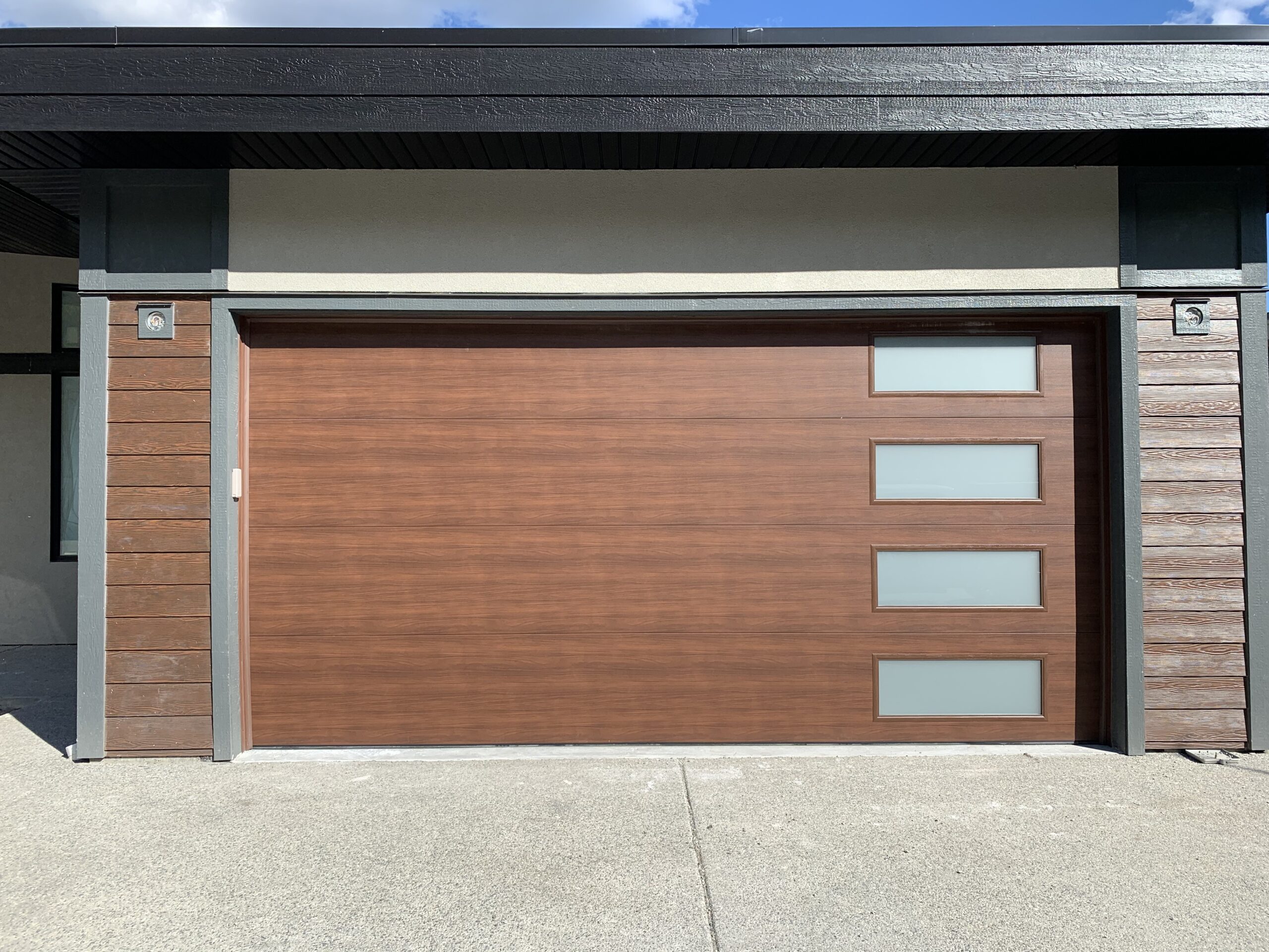 Faux wood modern garage door