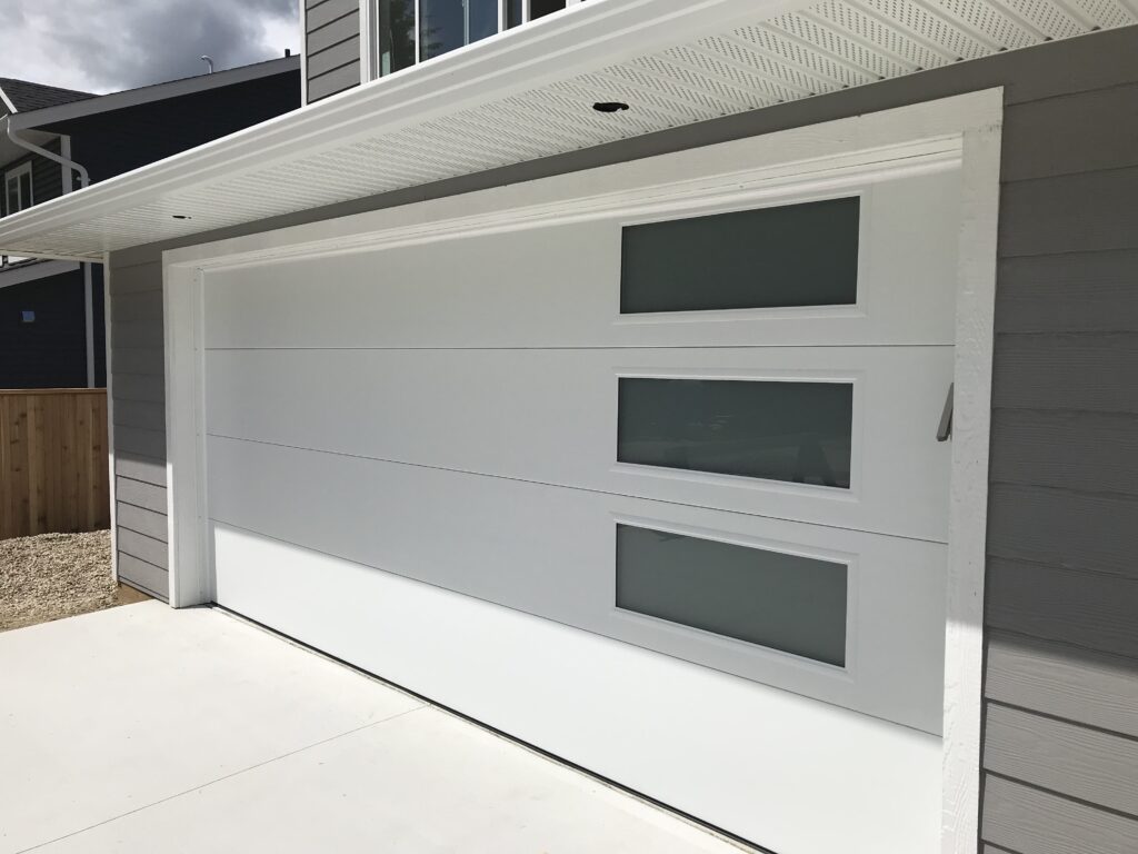White modern flush panel garage door