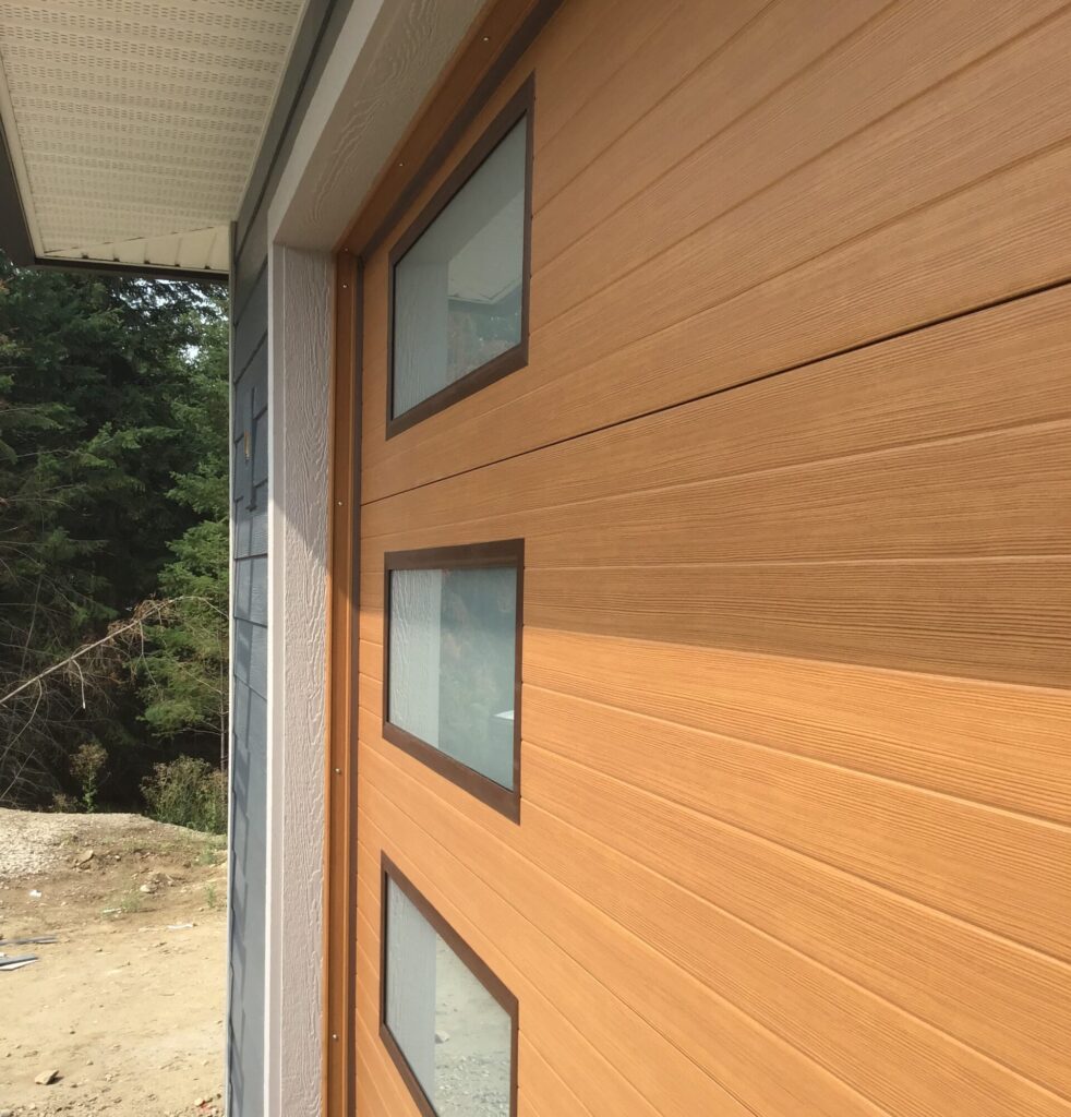 Modern plank faux wood garage door