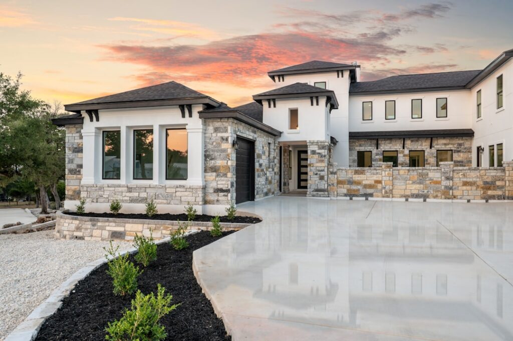 garage door material selection luxury home Okanagan Valley - how garage door material affects total project cost