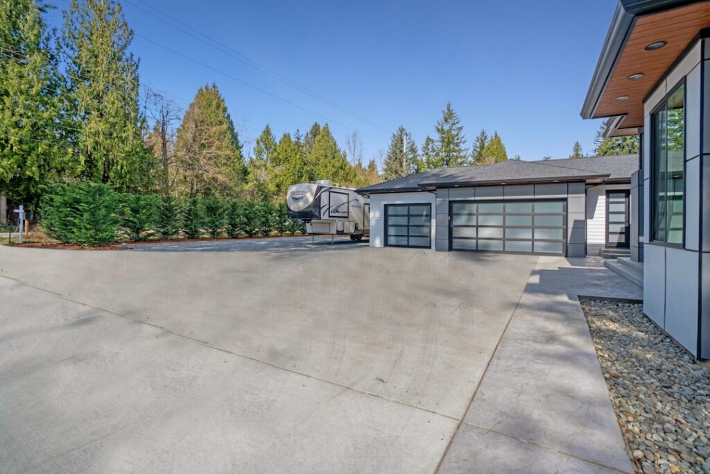 garage door on a modern home - how long does a garage door last