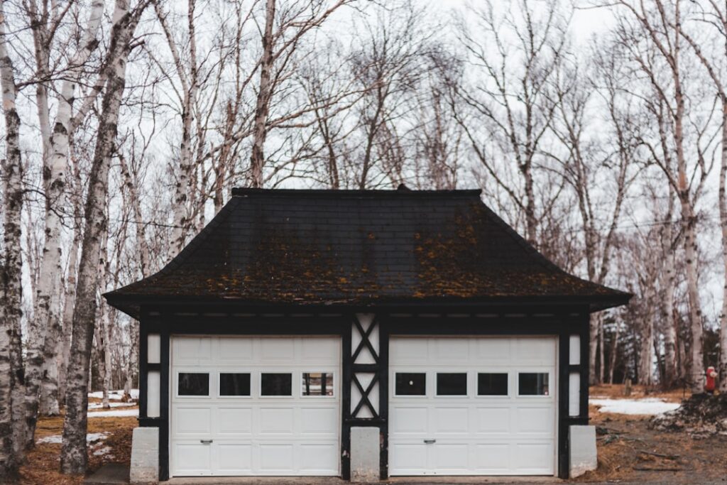 steel vs wood vs aluminum garage doors comparison residential BC neighborhood - steel vs wood vs aluminum garage doors