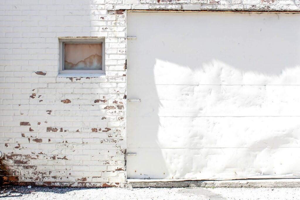 garage door repair vs replacement cost comparison